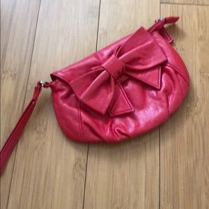 Icing red bow clutch/wristlet